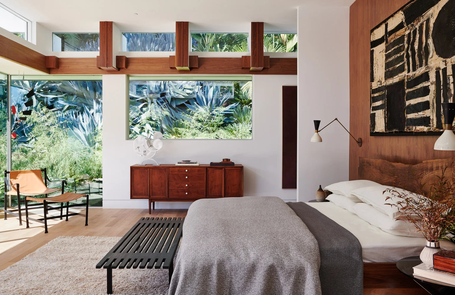 The main bedroom under a walnut beam.
