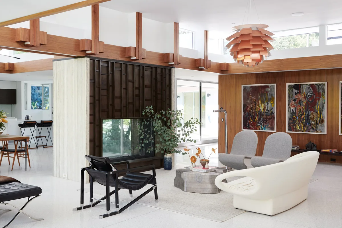 The living room at 1061 Loma Vista under its walnut ceiling.